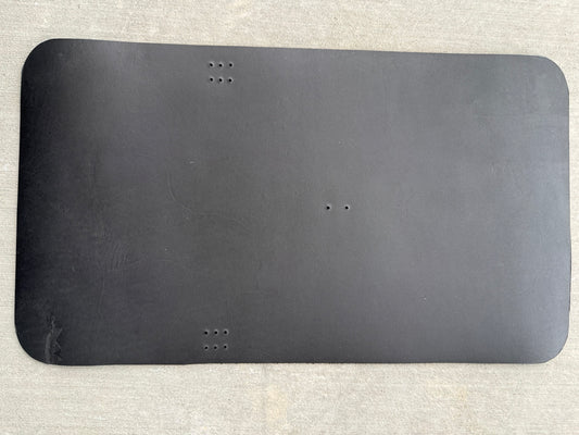A5 black veg-tan Studio Seconds journal with a scuff on the top-right corner