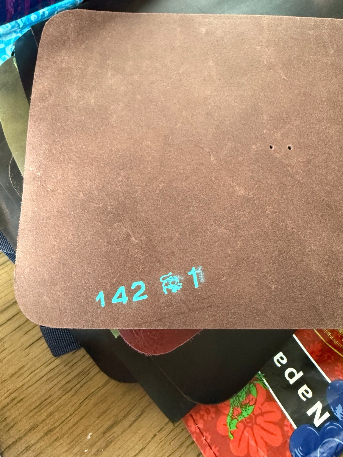 Blue stamped numbers on A5 brown veg tan Studio Seconds journal