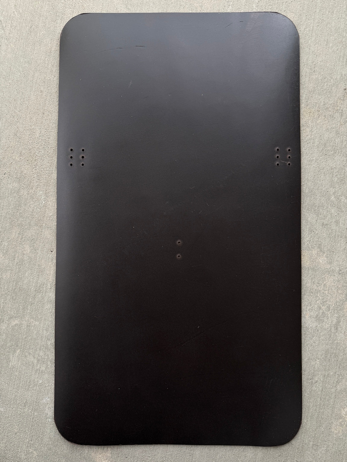 Example 1 of scuffs and scratches on an A5 espresso Studio Seconds journal