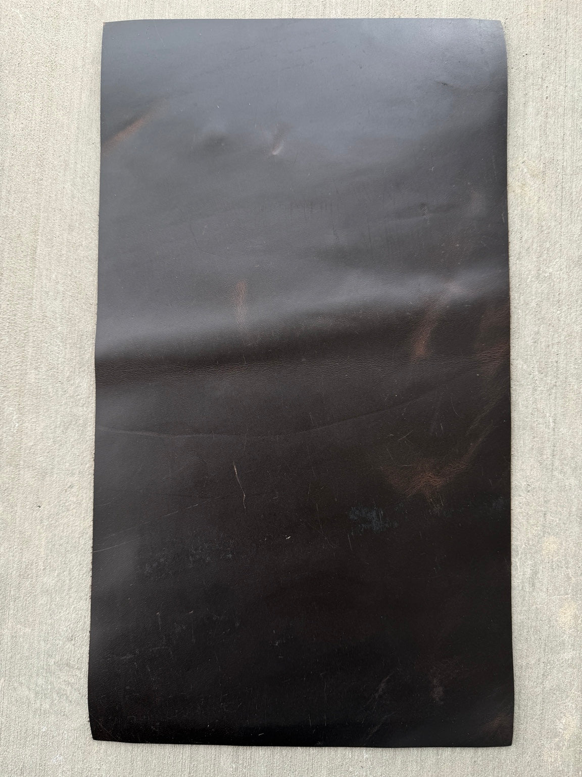 Example 3 of scuffs and scratches on an A5 espresso Studio Seconds journal