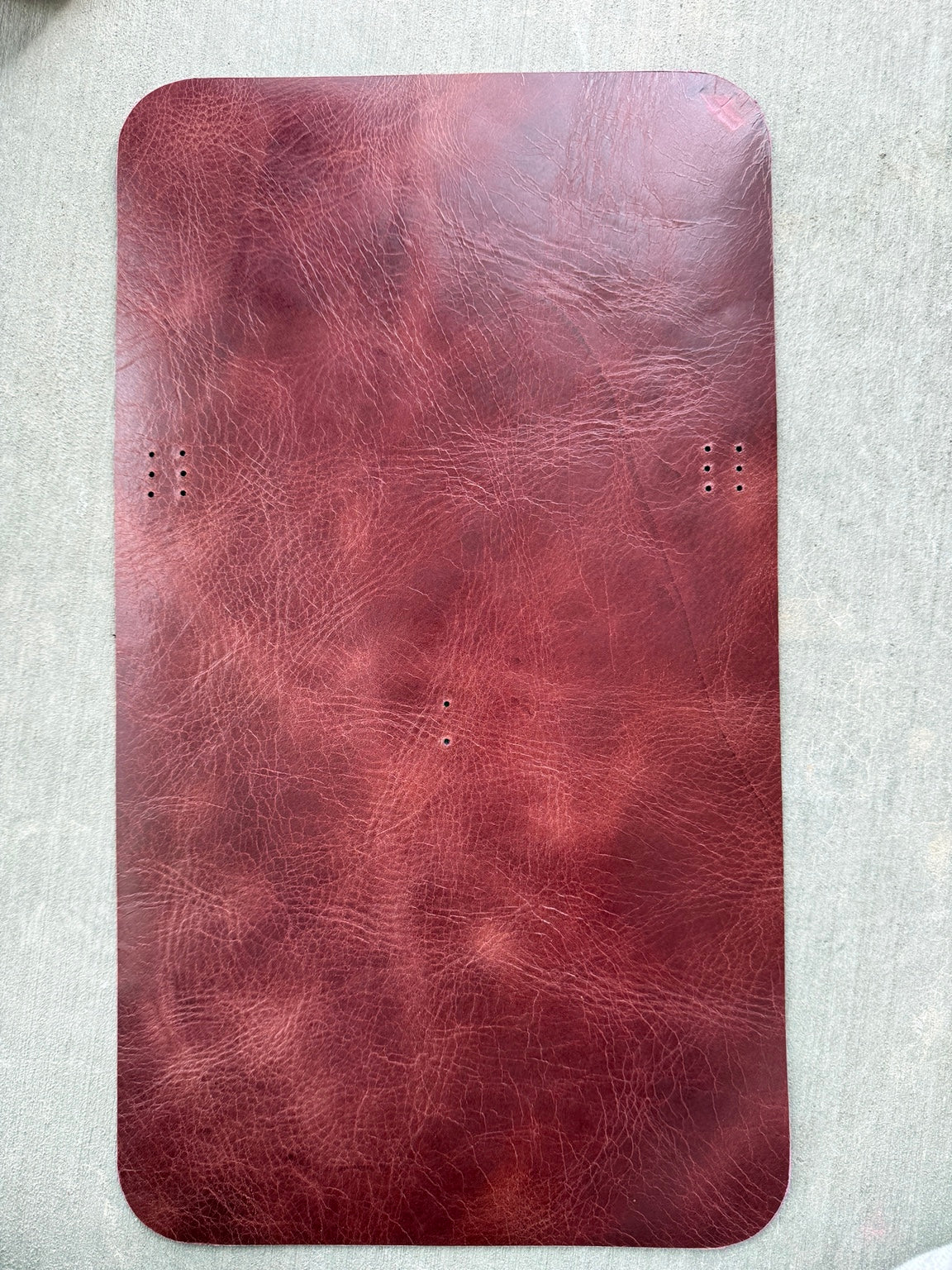 A5 maroon Studio Seconds journal with a scuff on the bottom-right corner