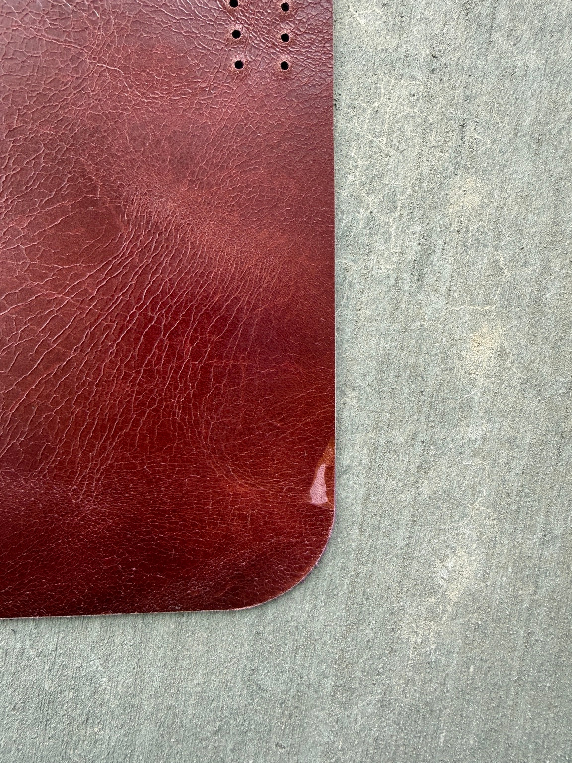 Close-up of scuff on the top-right corner of A5 maroon journal