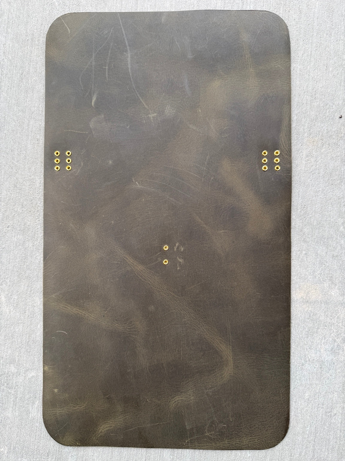 A5 olive green Studio Seconds journal with scratches and gold grommets