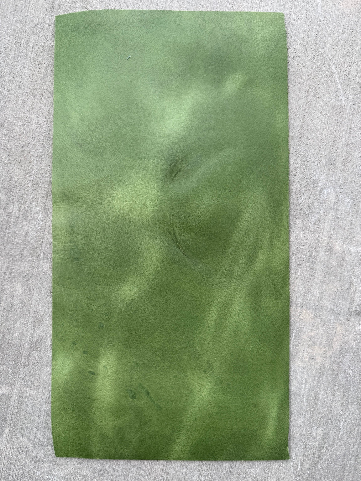 Indented scuff on an A6 pocket green Studio Seconds journal
